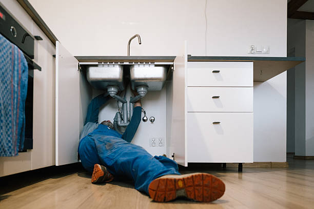 Professional Plumbing technician working in Mayking, KY